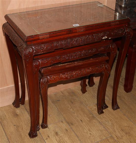 A graduated set of three Chinese hardwood tables, Communist era W.67cm